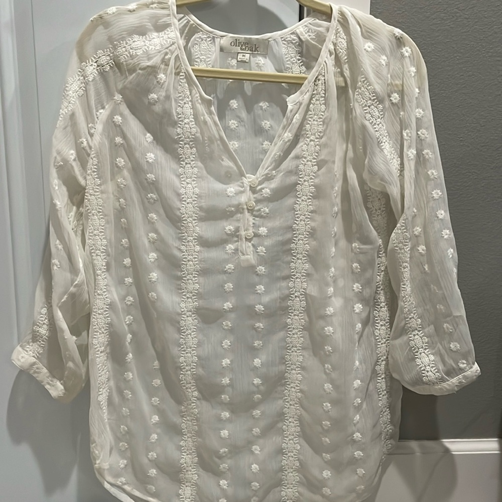 Sheer patterned blouse in cream